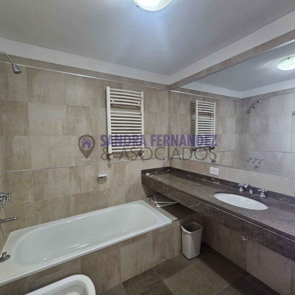 Neuquen. Alquiler Departamento 2 dormitorios (suite) Cochera Baulera