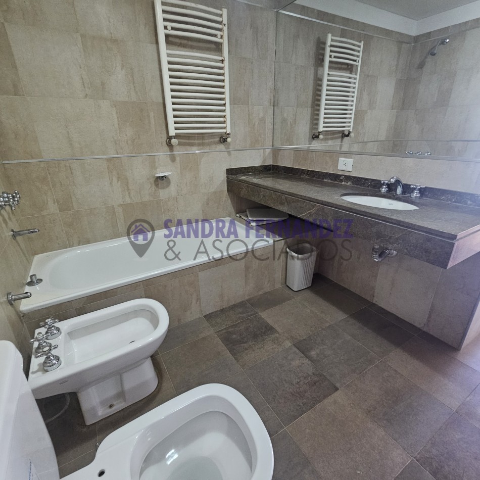 Neuquen. Alquiler Departamento 2 dormitorios (suite) Cochera Baulera
